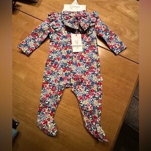 Colorful floral baby outfit. Size 3 month. Has a headband bow that matches.